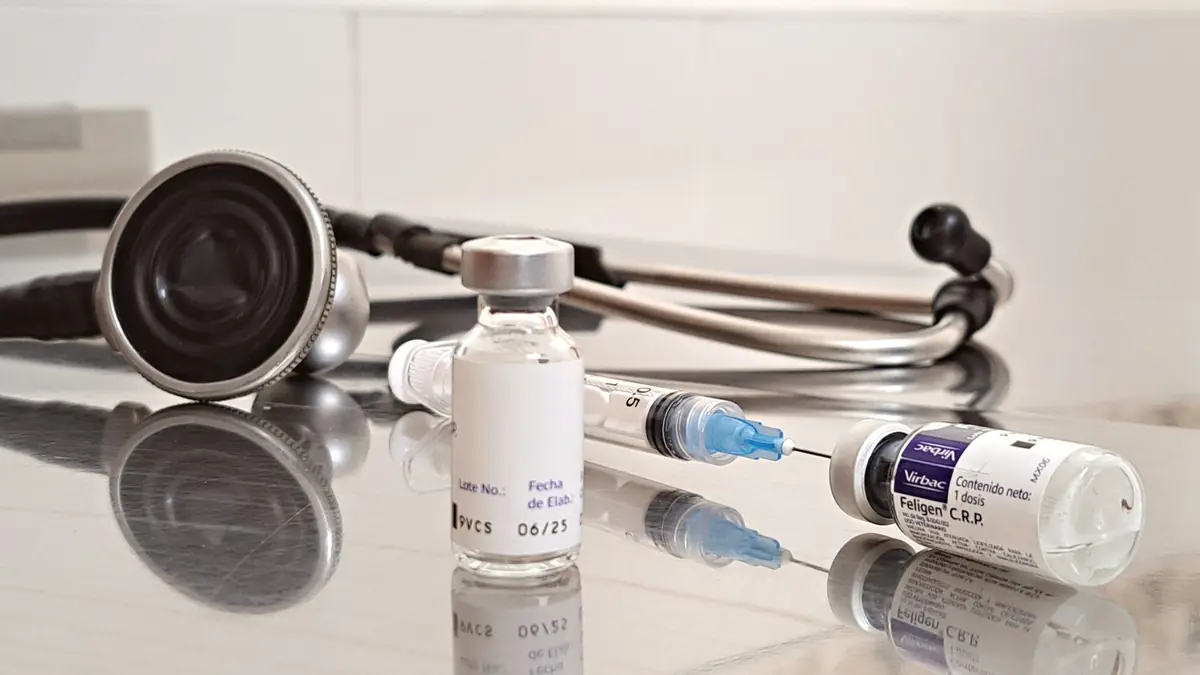 Medication vials, a syringe, and a stethoscope on a reflective clinical surface, illustrating Botox marketing ideas
